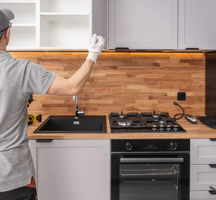 cabinetmaker-finishing-kitchen-cabinets-installati-2026-01-08-23-43-07-utc