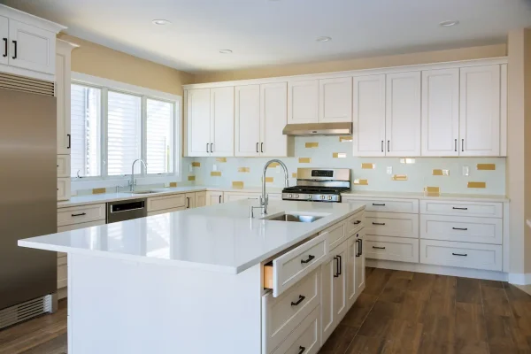 installing-cabinets-and-counter-top-a-white-kitche-2026-03-11-04-23-23-utc